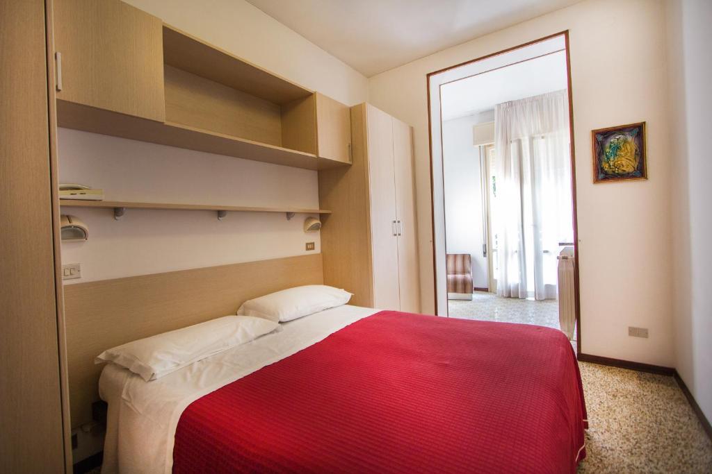 Postel nebo postele na pokoji v ubytování Casa Portofino Rooms&Breakfast