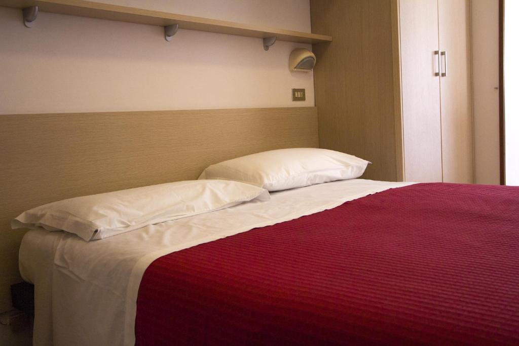 Postel nebo postele na pokoji v ubytování Casa Portofino Rooms&Breakfast