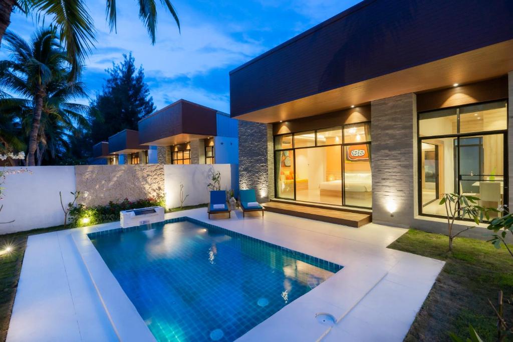 Bazén v ubytování Dhevan Dara Resort & Spa Hua Hin - Pool Villa nebo v jeho okolí