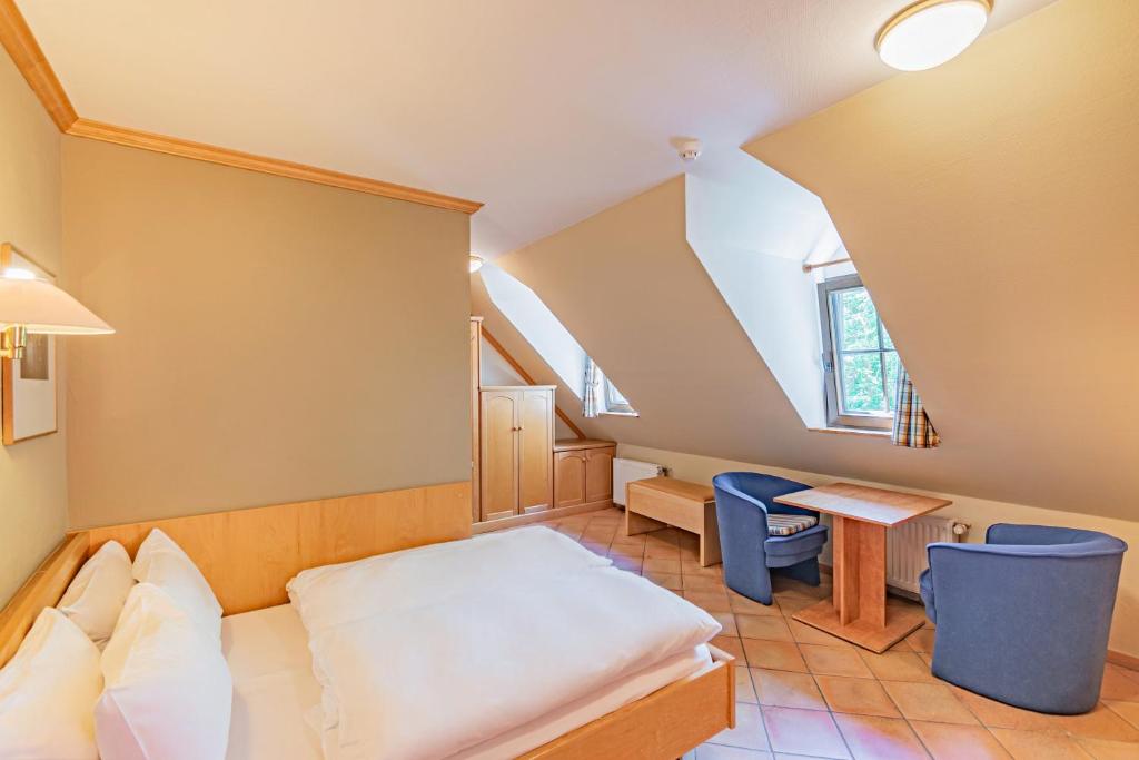 Postel nebo postele na pokoji v ubytování Aux Tanneries de Wiltz