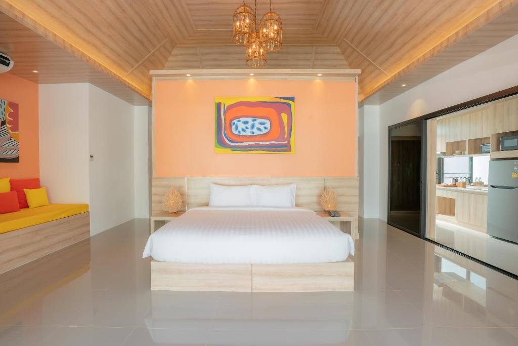 Postel nebo postele na pokoji v ubytování Dhevan Dara Resort & Spa Hua Hin - Pool Villa