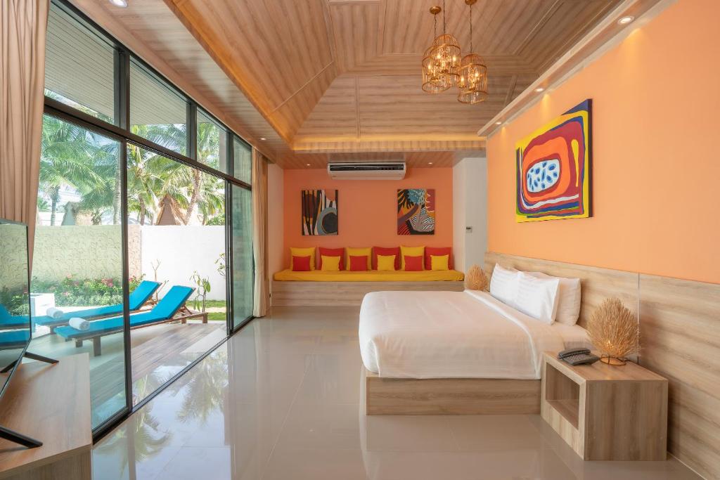 Postel nebo postele na pokoji v ubytování Dhevan Dara Resort & Spa Hua Hin - Pool Villa