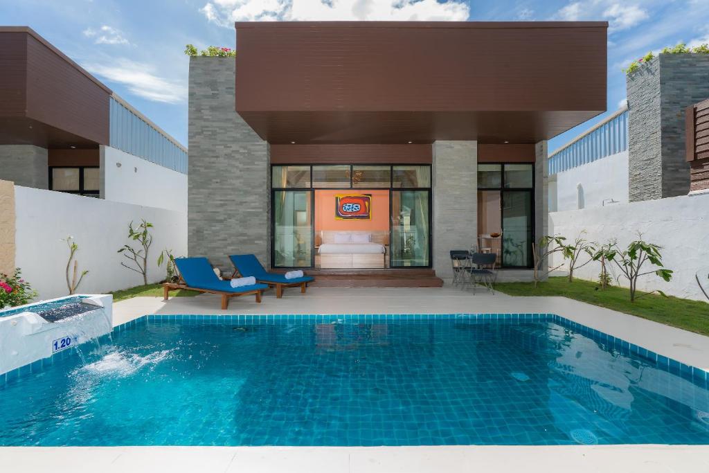 Bazén v ubytování Dhevan Dara Resort & Spa Hua Hin - Pool Villa nebo v jeho okolí