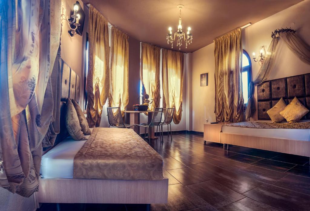 Łóżko lub łóżka w pokoju w obiekcie Abbacy Katiana's Castelleti 1