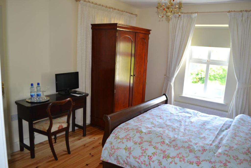 Postel nebo postele na pokoji v ubytování Guaire House Killarney