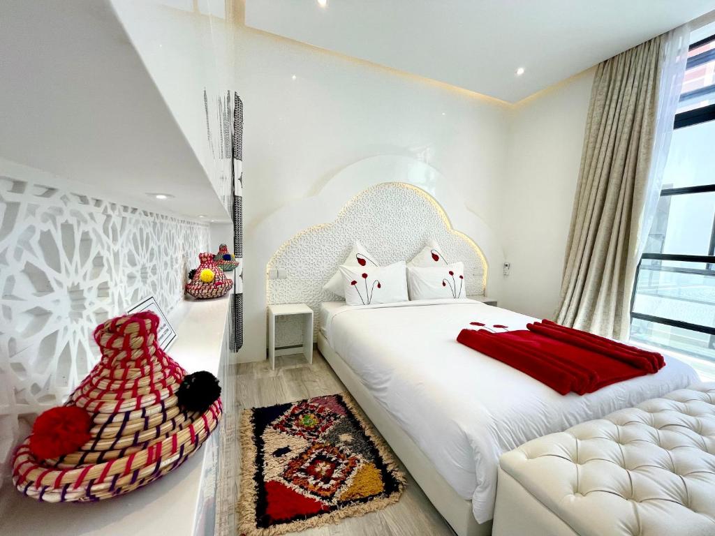 Postel nebo postele na pokoji v ubytování RIAD NOLITA & SPA Kasbah
