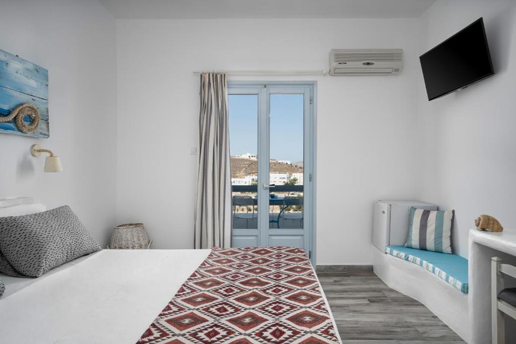 Postel nebo postele na pokoji v ubytování Hotel Iris
