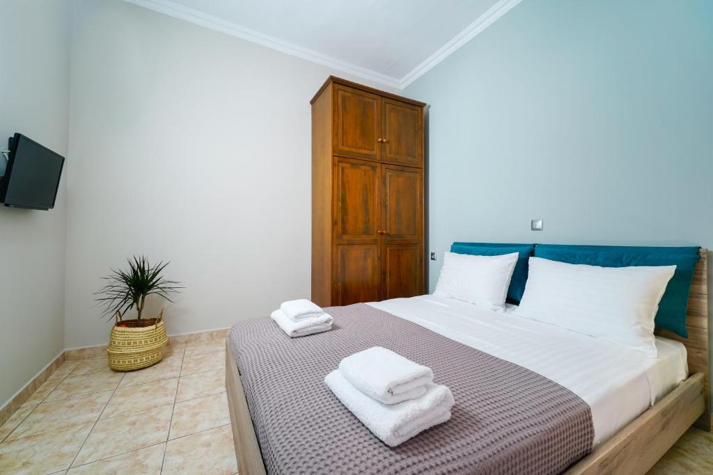 Postel nebo postele na pokoji v ubytování Notos House