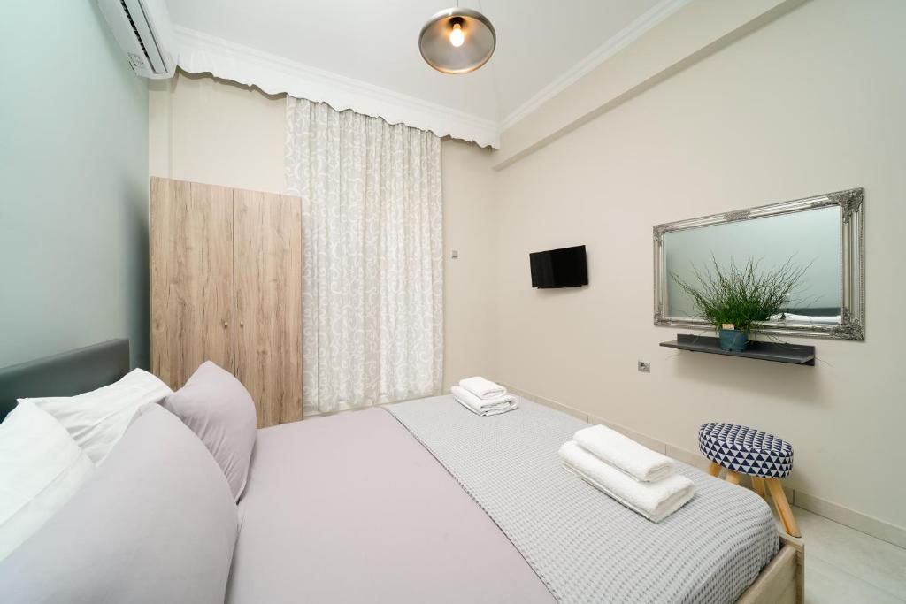 Postel nebo postele na pokoji v ubytování Notos House