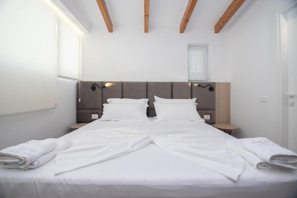 Postel nebo postele na pokoji v ubytování Hotel PortSide GF