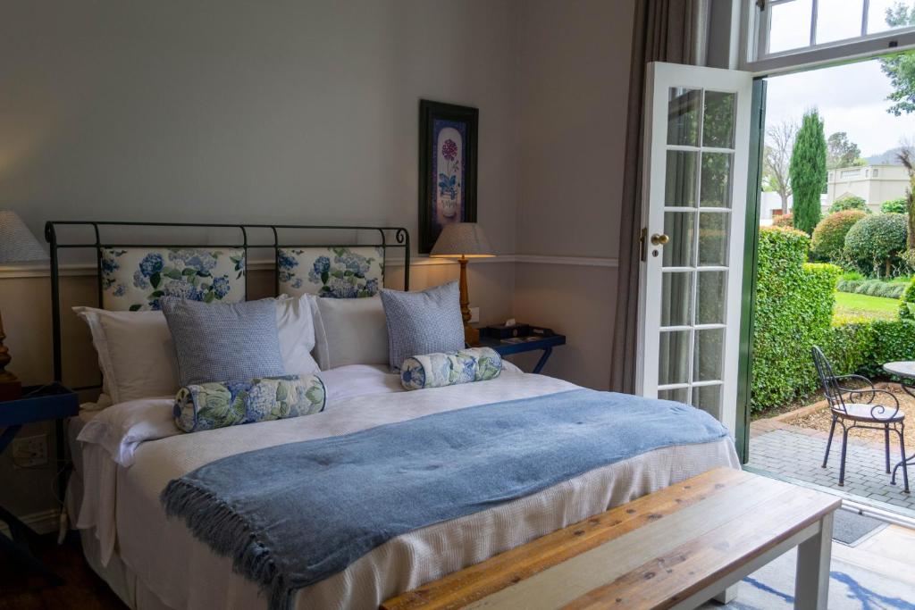 Letto o letti in una camera di Van der Stel Manor