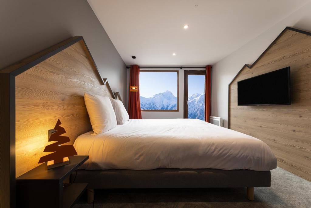 TV a/nebo společenská místnost v ubytování Hotel Base Camp Lodge - Les 2 Alpes