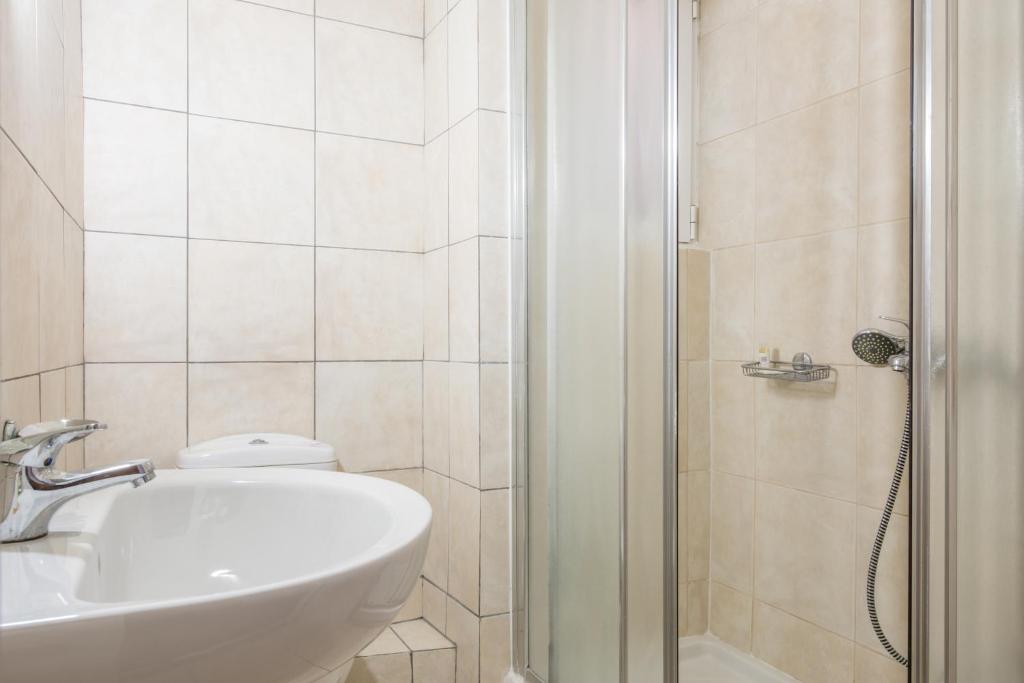 Koupelna v ubytování Myrto Hotel