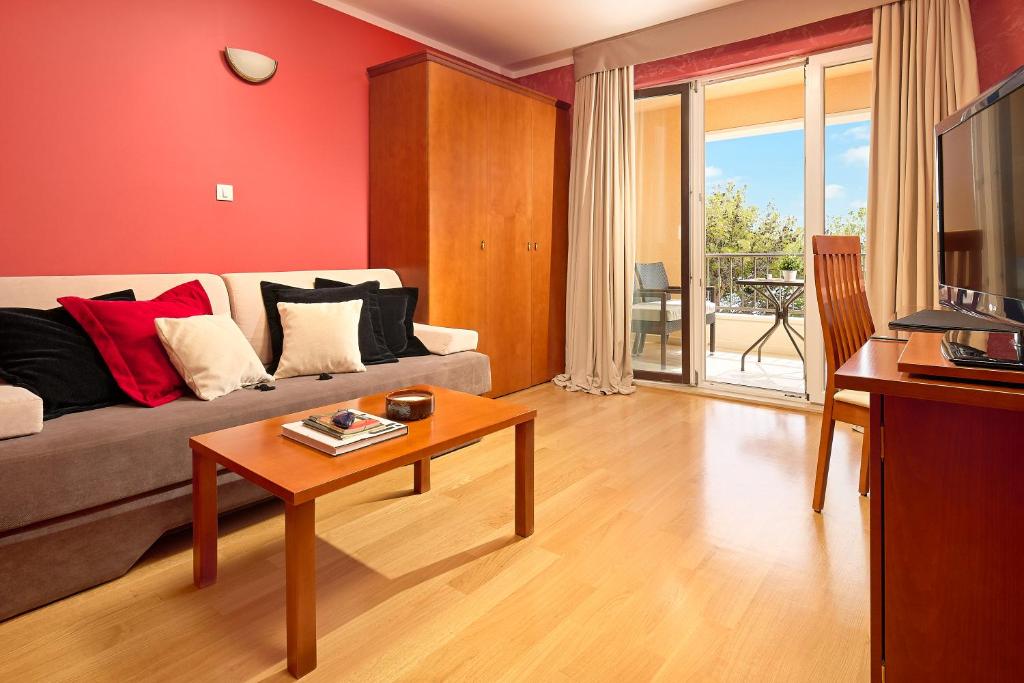 TV a/nebo společenská místnost v ubytování Hotel Villa Andrea