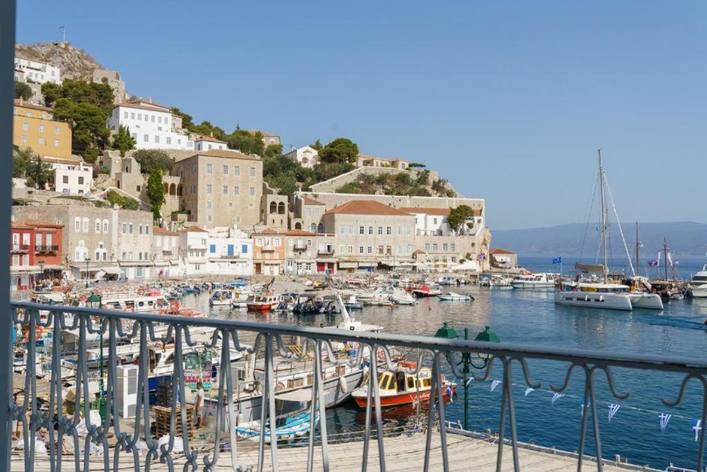 a group of boats docked in a harbor at THE YDRA VIEW APARTMENTS in Hydra