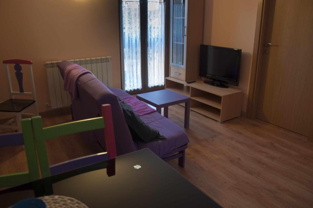 Telewizja i/lub zestaw kina domowego w obiekcie La casa del rebote