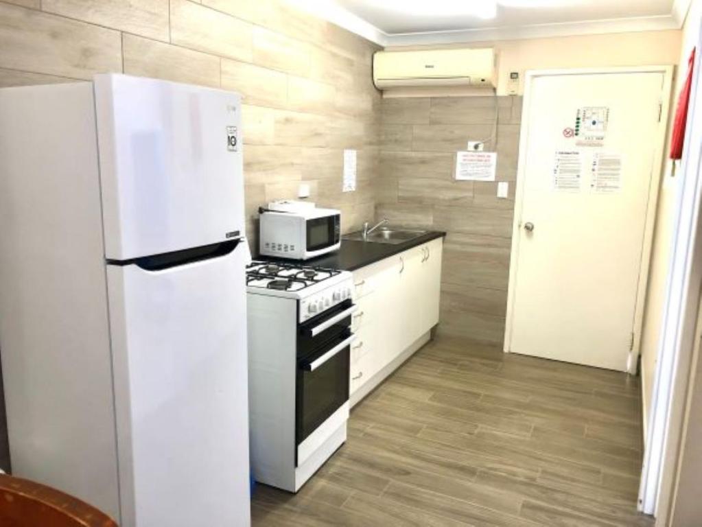 Kuchyň nebo kuchyňský kout v ubytování Bay Lodge