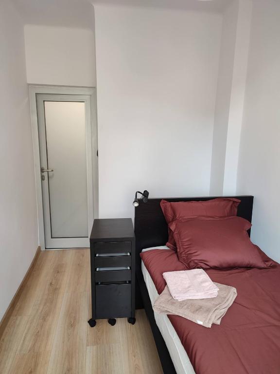 Posteľ alebo postele v izbe v ubytovaní APARTAMENT PRZY PARKU ŚRÓDMIEŚCIE