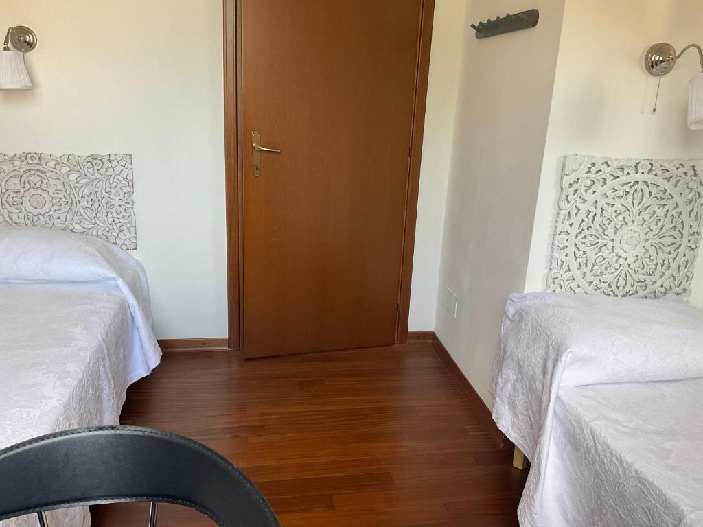 A bed or beds in a room at Rana B&B