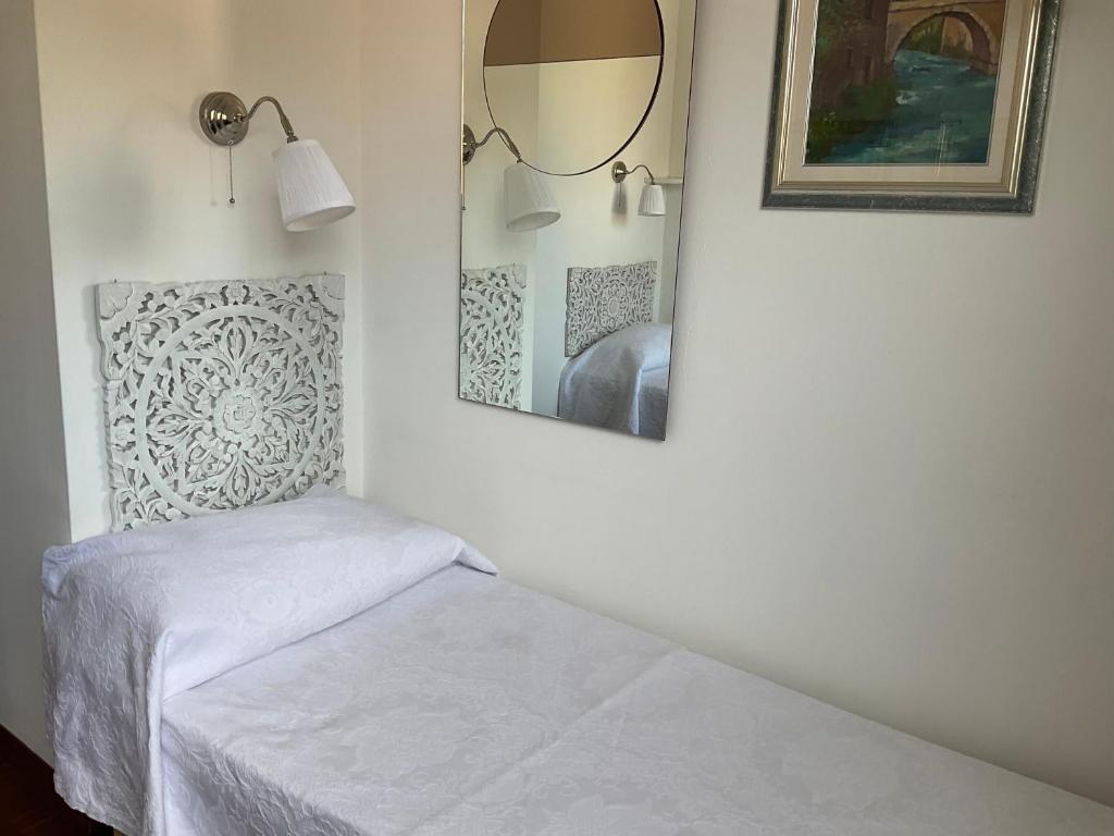 A bed or beds in a room at Rana B&B