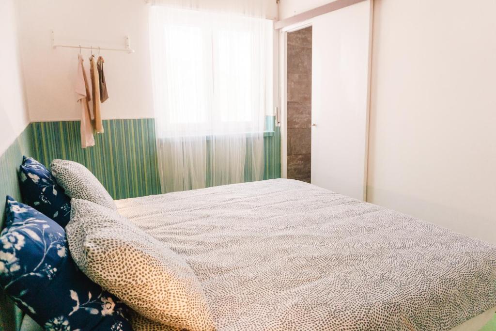 Llit o llits en una habitació de Hospedium Hostel República Surf House
