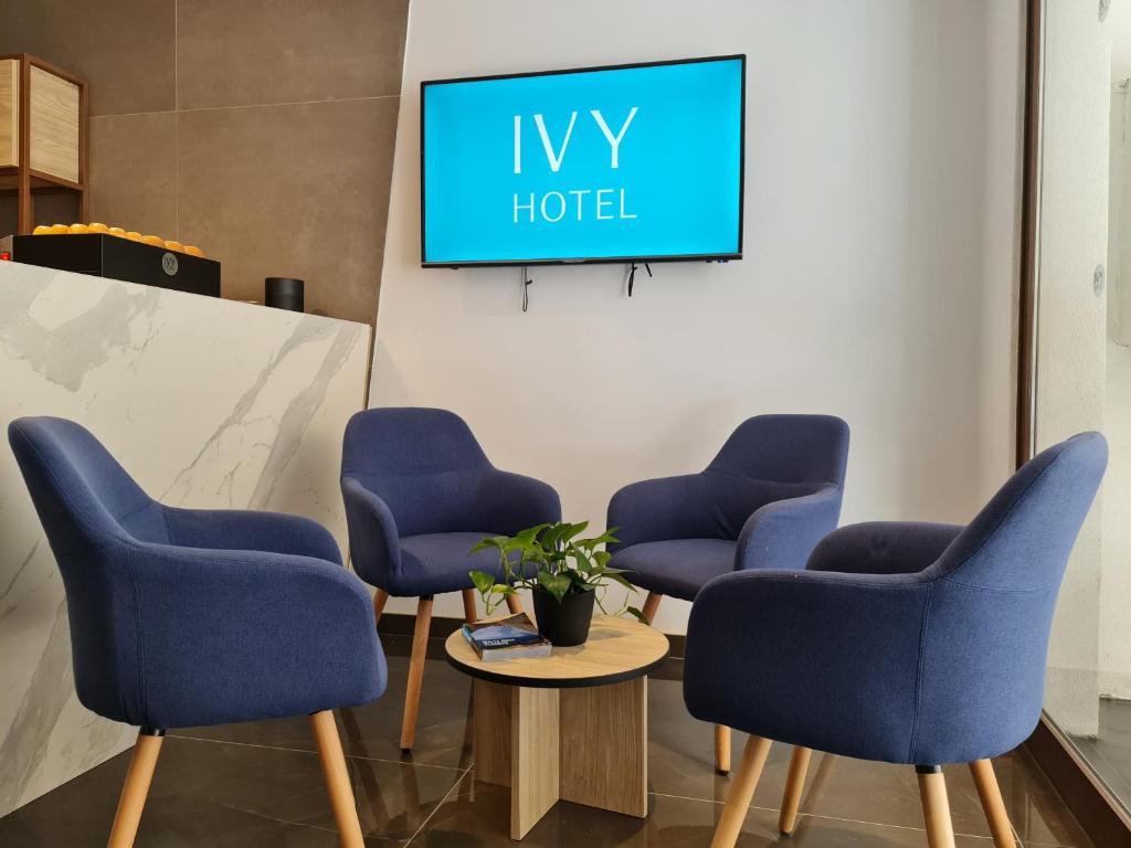 TV a/nebo společenská místnost v ubytování Ivy Hotel - Adults Only