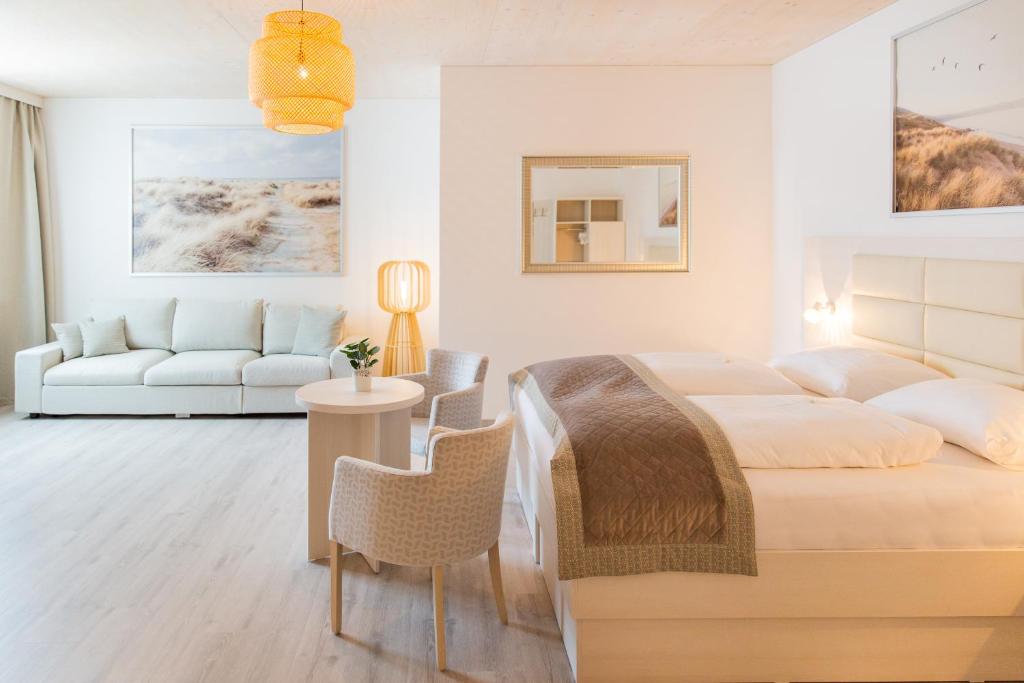 Postel nebo postele na pokoji v ubytování Hotel Rösch
