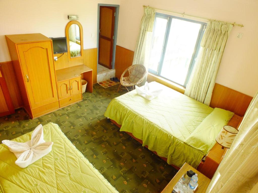 Cama o camas de una habitación en Hotel Greenland