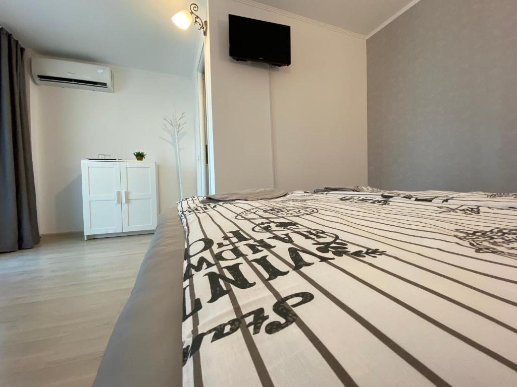 Postel nebo postele na pokoji v ubytování Four Rooms