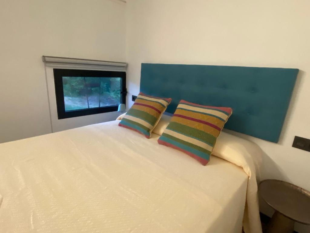 Postel nebo postele na pokoji v ubytování Vagón Orient Express - Housevanlive