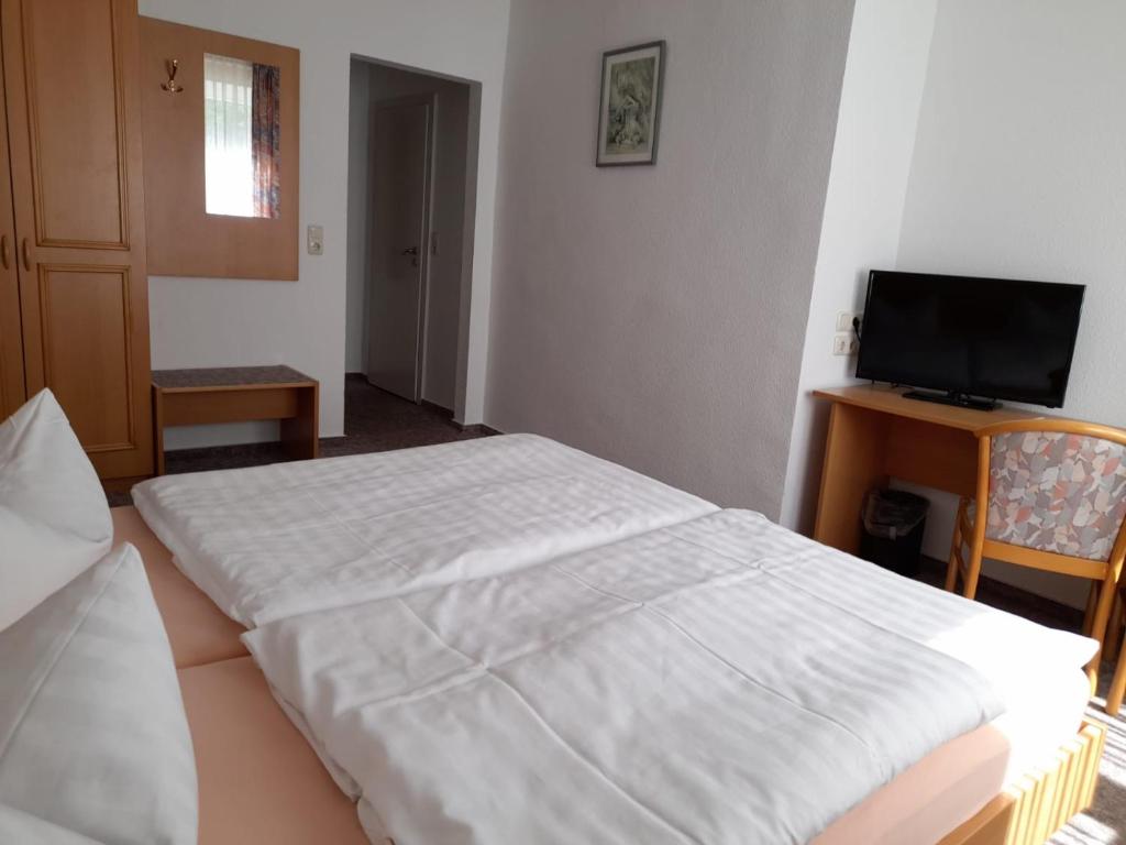 Postel nebo postele na pokoji v ubytování Pension Landhaus Machold