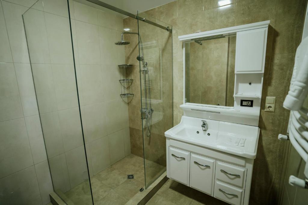 Koupelna v ubytování West Apart Hotel
