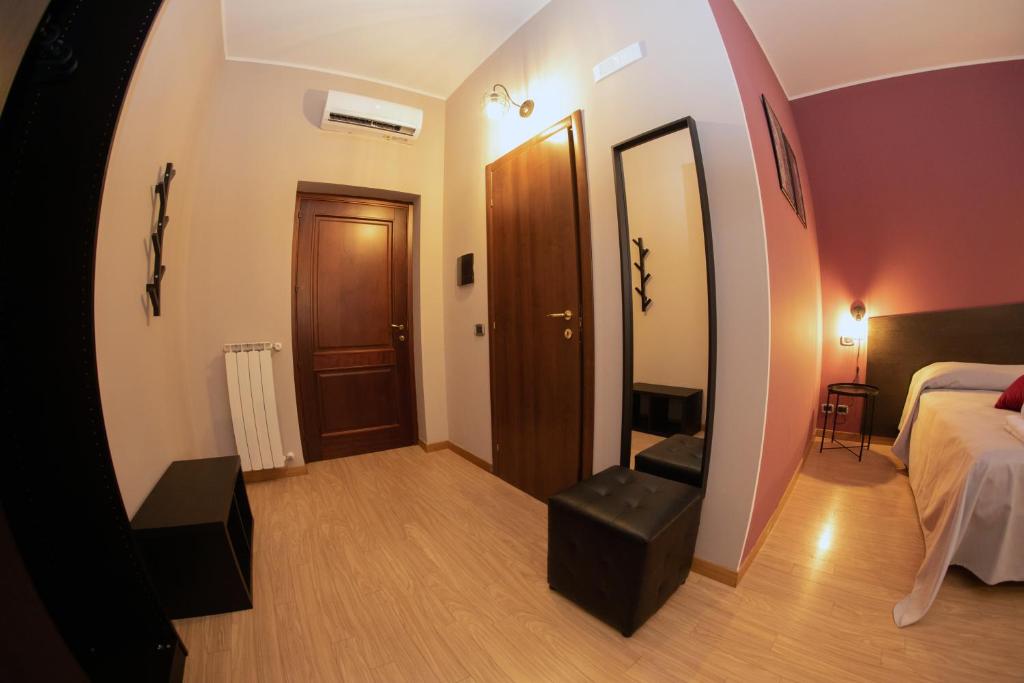 Posteľ alebo postele v izbe v ubytovaní Hotel Marconi