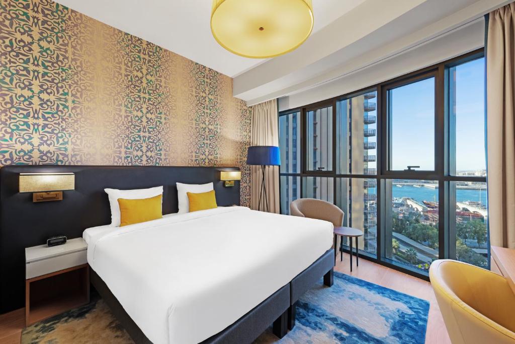 
Кровать или кровати в номере Aparthotel Adagio Dubai Deira
