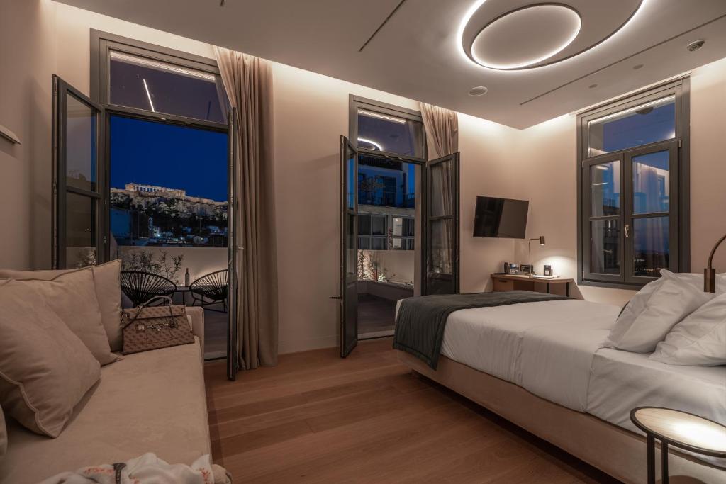 Postel nebo postele na pokoji v ubytování Hellenic Vibes Smart Hotel
