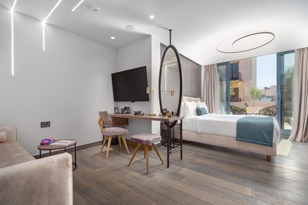 Postel nebo postele na pokoji v ubytování Hellenic Vibes Smart Hotel