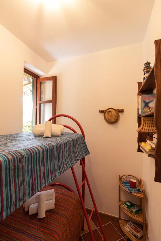 Postel nebo postele na pokoji v ubytování Villa Dei Gabbiani