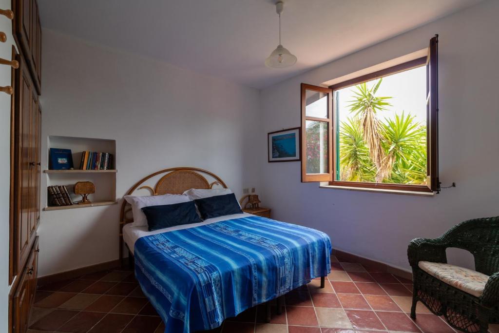 Cama ou camas em um quarto em Villa Dei Gabbiani