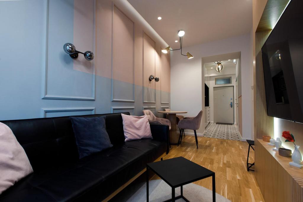 Telewizja i/lub zestaw kina domowego w obiekcie ZEUS Design Apartments Wasserwelt