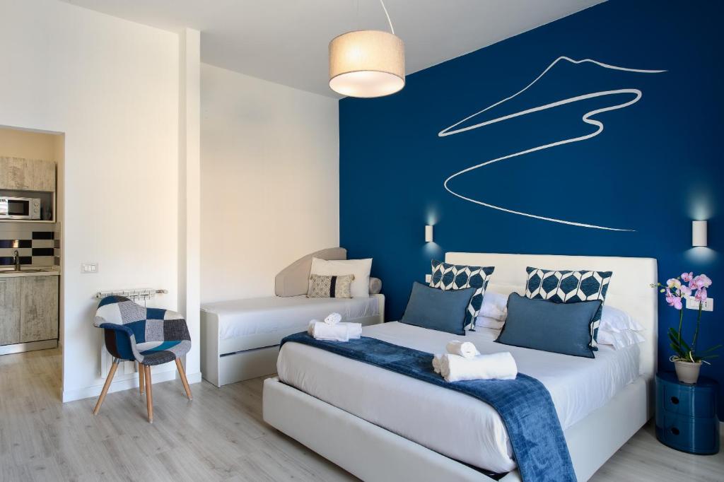 Postel nebo postele na pokoji v ubytování Les Suites des Tout le Monde
