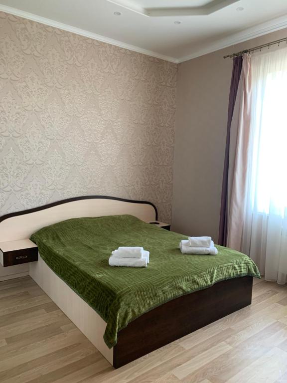 Postel nebo postele na pokoji v ubytování Viktoria