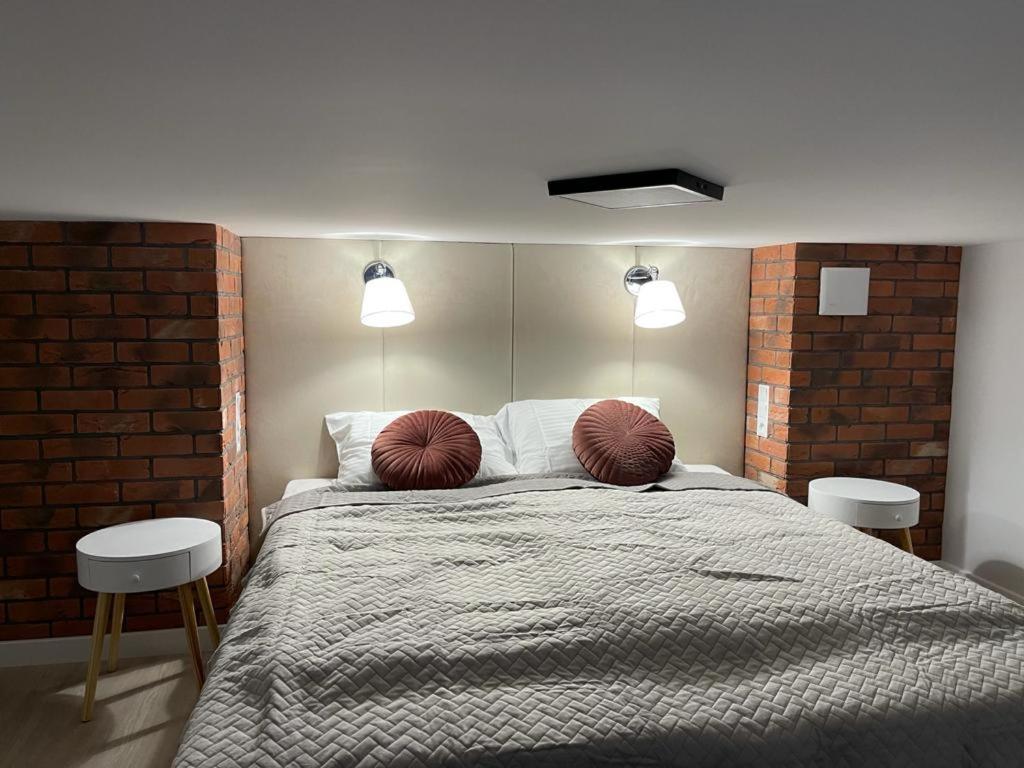 Postel nebo postele na pokoji v ubytování Apartamenty MGA Lividus 15