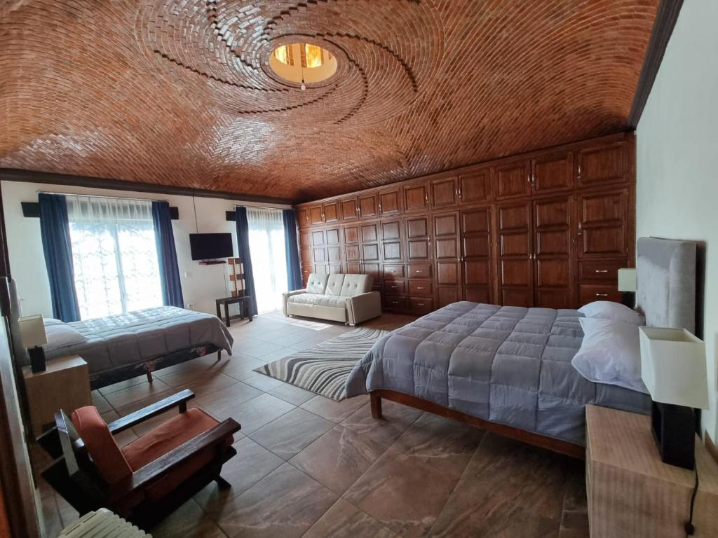 Postel nebo postele na pokoji v ubytování Real de Corralejo