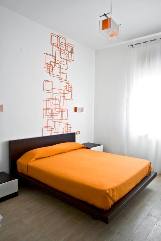 Postel nebo postele na pokoji v ubytování inStile aparthotel