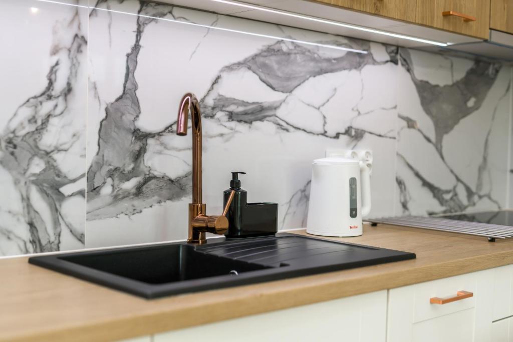 Kuchyňa alebo kuchynka v ubytovaní Apartments Na Podgórniku by Renters Prestige