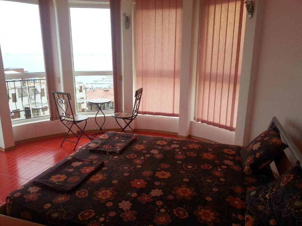 Postel nebo postele na pokoji v ubytování Hotel Saint Tatyana