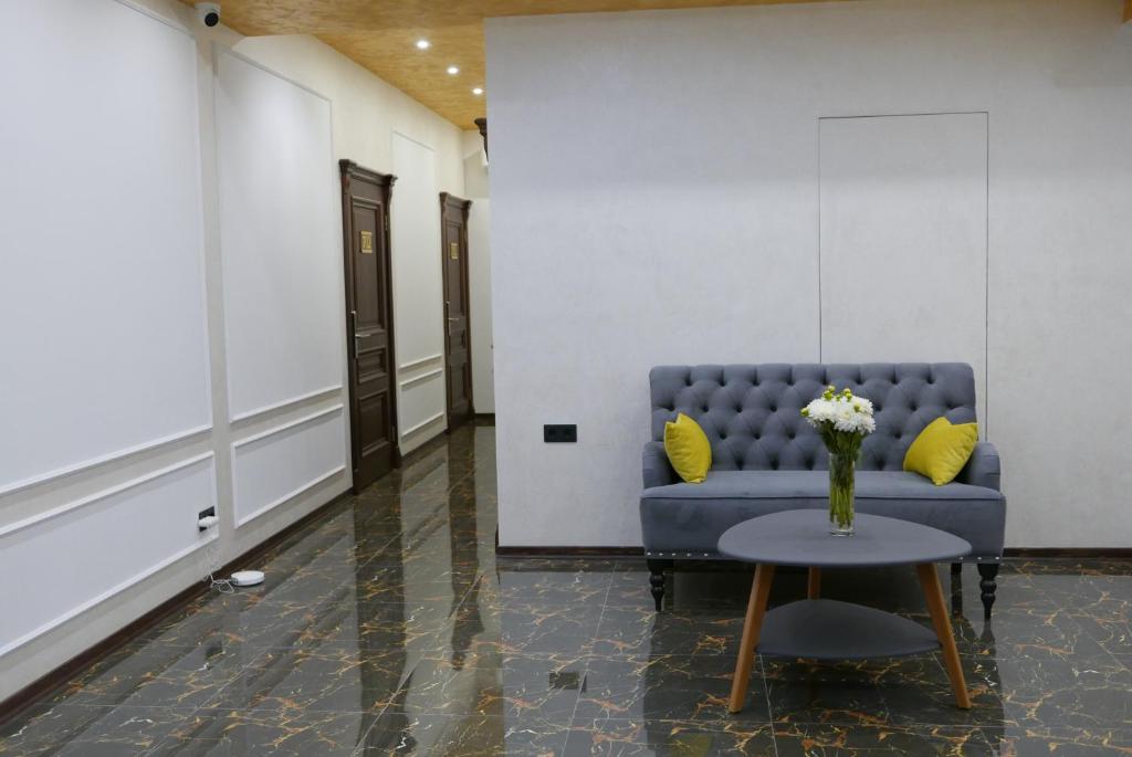 Posezení v ubytování Arch Apart Hotel