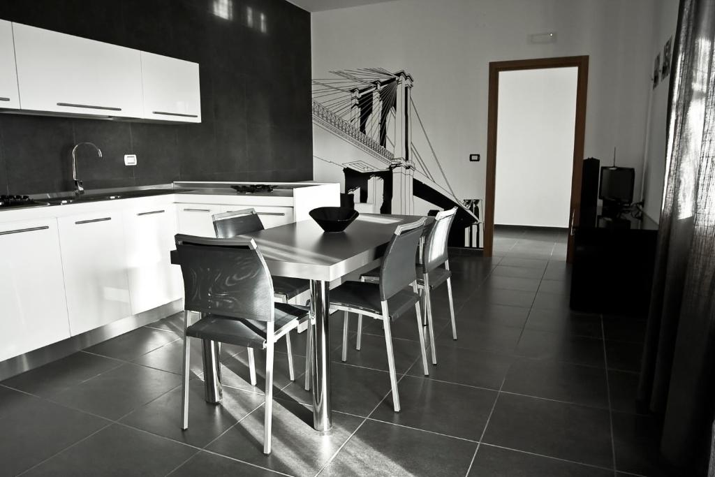 Kuchyň nebo kuchyňský kout v ubytování inStile aparthotel