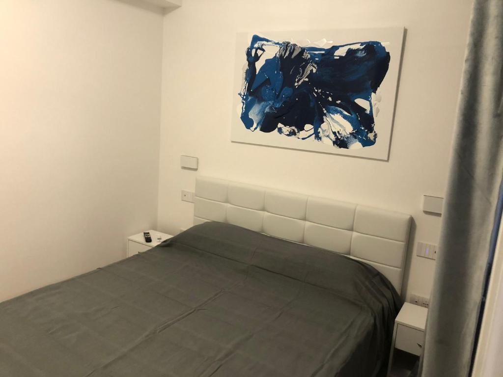 Postel nebo postele na pokoji v ubytování Skyandsand Alghero