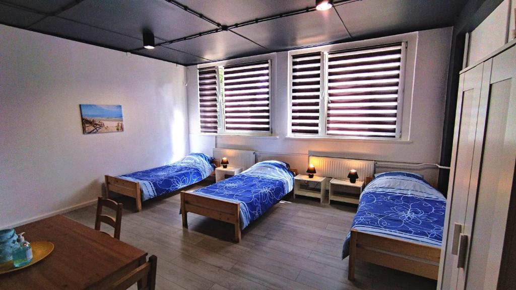 Postel nebo postele na pokoji v ubytování Smart Stay Hostel Gdynia